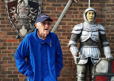 A resident from Lukestone Care Home enjoying the knight display at Hop Farm