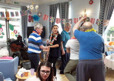 Residents partying Caribbean style at Lukestone Care Home (3 of 9)
