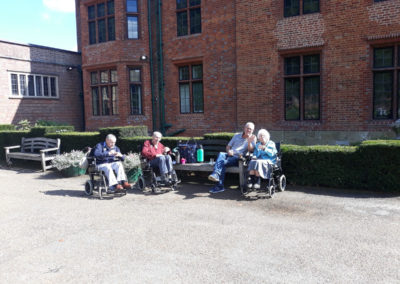 Lukestone Care Home residents with enjoying an afternoon drink outside Chartwell House