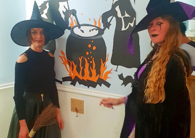 Two staff members from Lukestone Care Home dressed up as Halloween witches