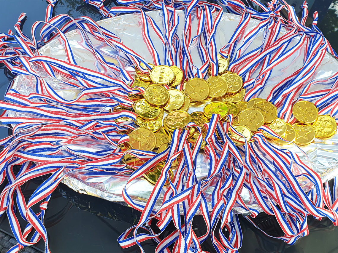 A tray of medals for the sports day at Lukestone Care Home