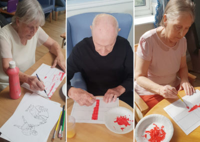 Lukestone Care Home residents colouring English flags and St George's Day pictures