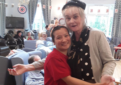 Member of staff enjoying a dance with a resident at Lukestone