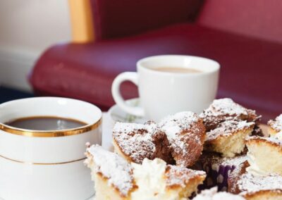 Relax with a hot drink and a cake in our Visitors Lounge at Lukestone Care Home