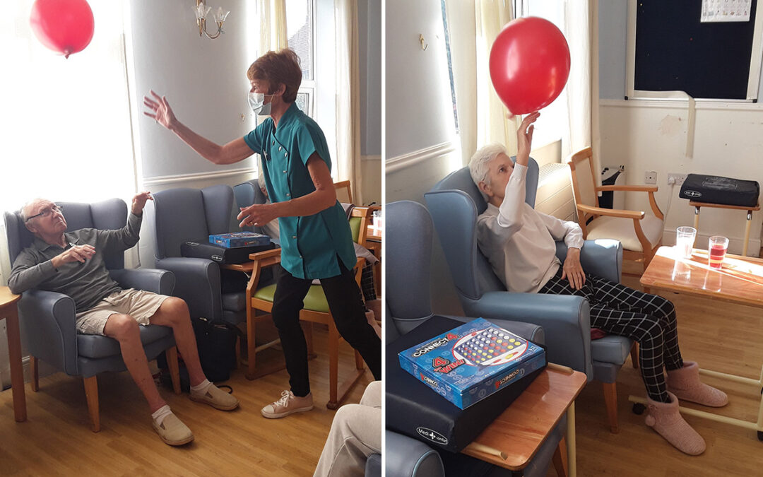 Seated balloon volleyball at Lukestone Care Home