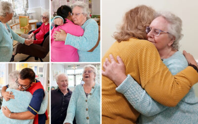 Resident Brenda sharing warm hugs and happy moments with friends and Carers during her respite stay at Lukestone Care Home.
